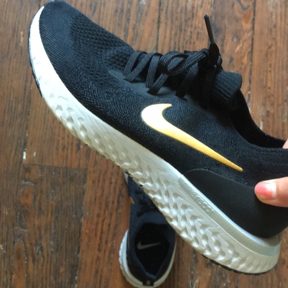 nike epic react black gold